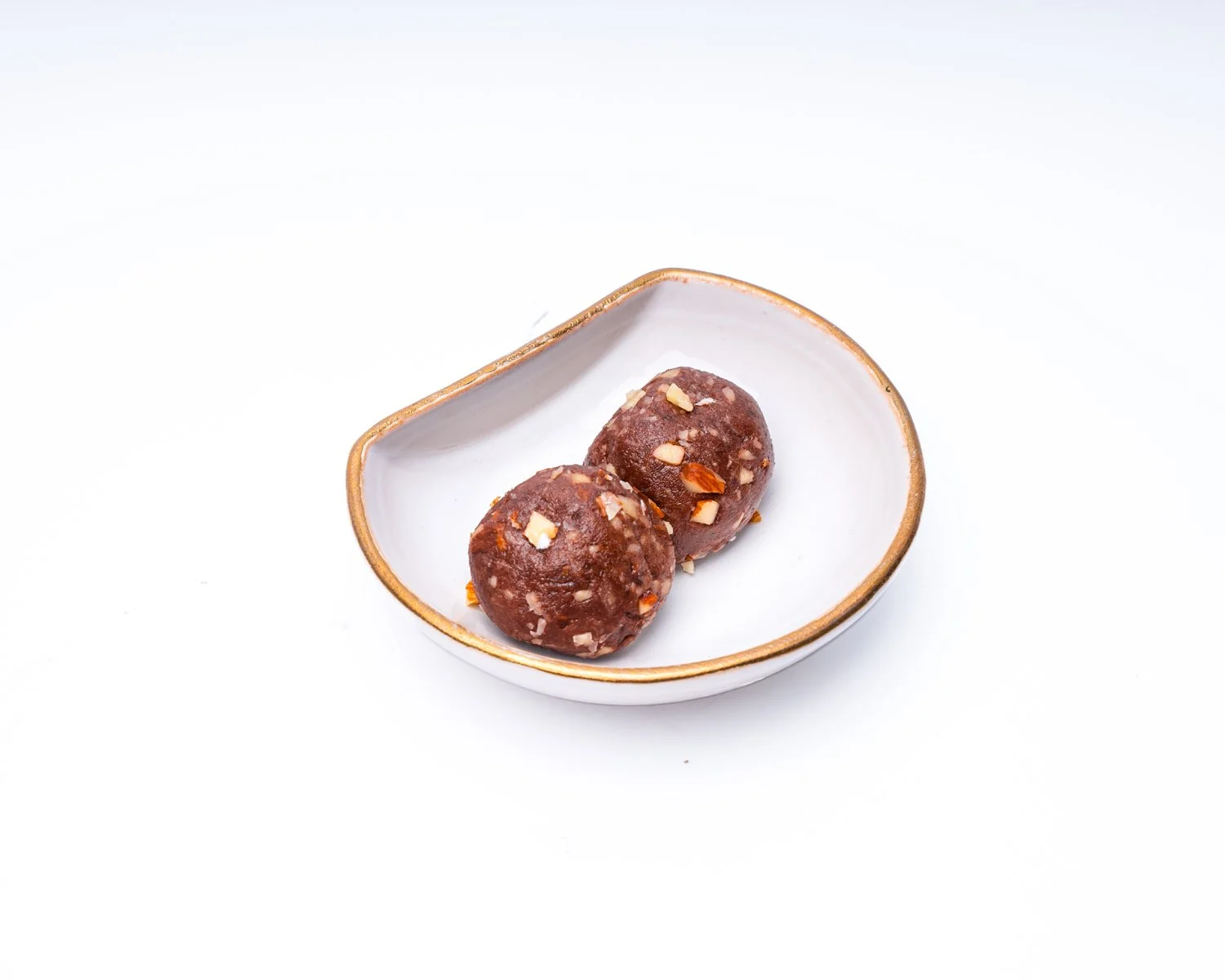 Cacao Almond Energy Bites — Dates, cacao, almonds — two-piece protein bites.