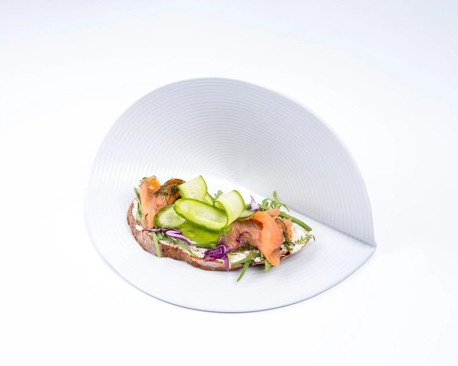 Smoked Salmon Sourdough — Sourdough, avocado, smoked salmon, pickled cucumber.
